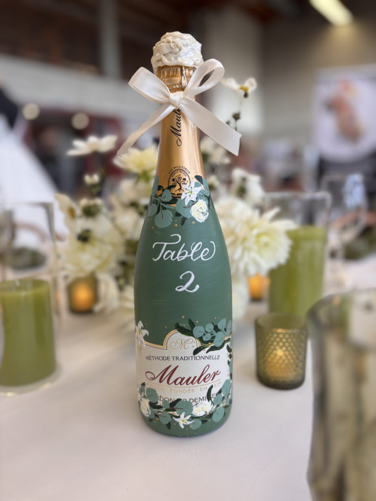 Sanda Letter_Engraver & Calligrapher in Switzerland_BOTTLE PAINTING_Green Mauler Table number