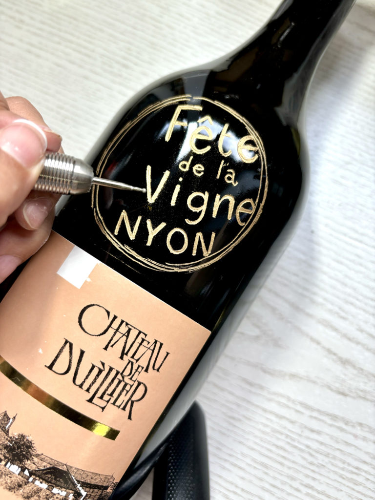 Sanda Letter engraving and calligraphy in Switzerland - bottle engraving vine